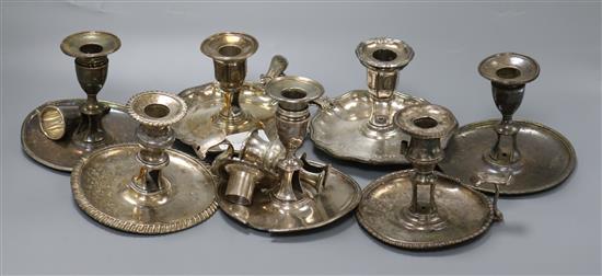 Seven assorted 19th century plated chambersticks, five odd sconces and a snuffer